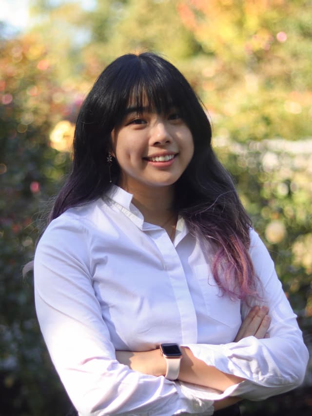 Grace Tan smiling outdoors